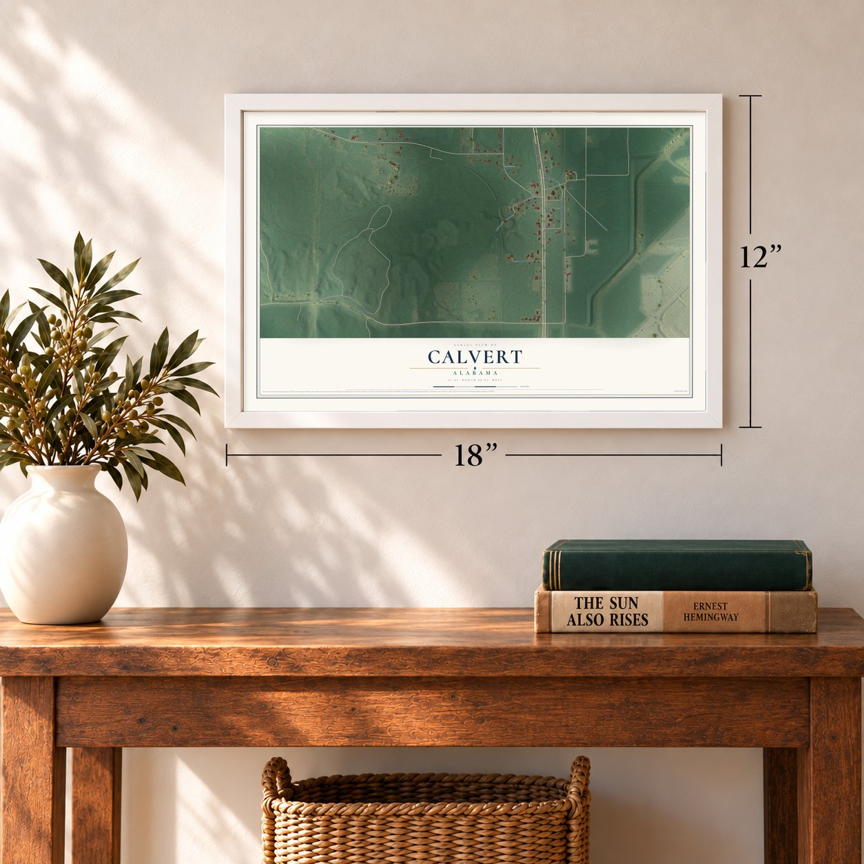 Calvert, Alabama map, 12 x 18 inch print in a white frame in an entryway