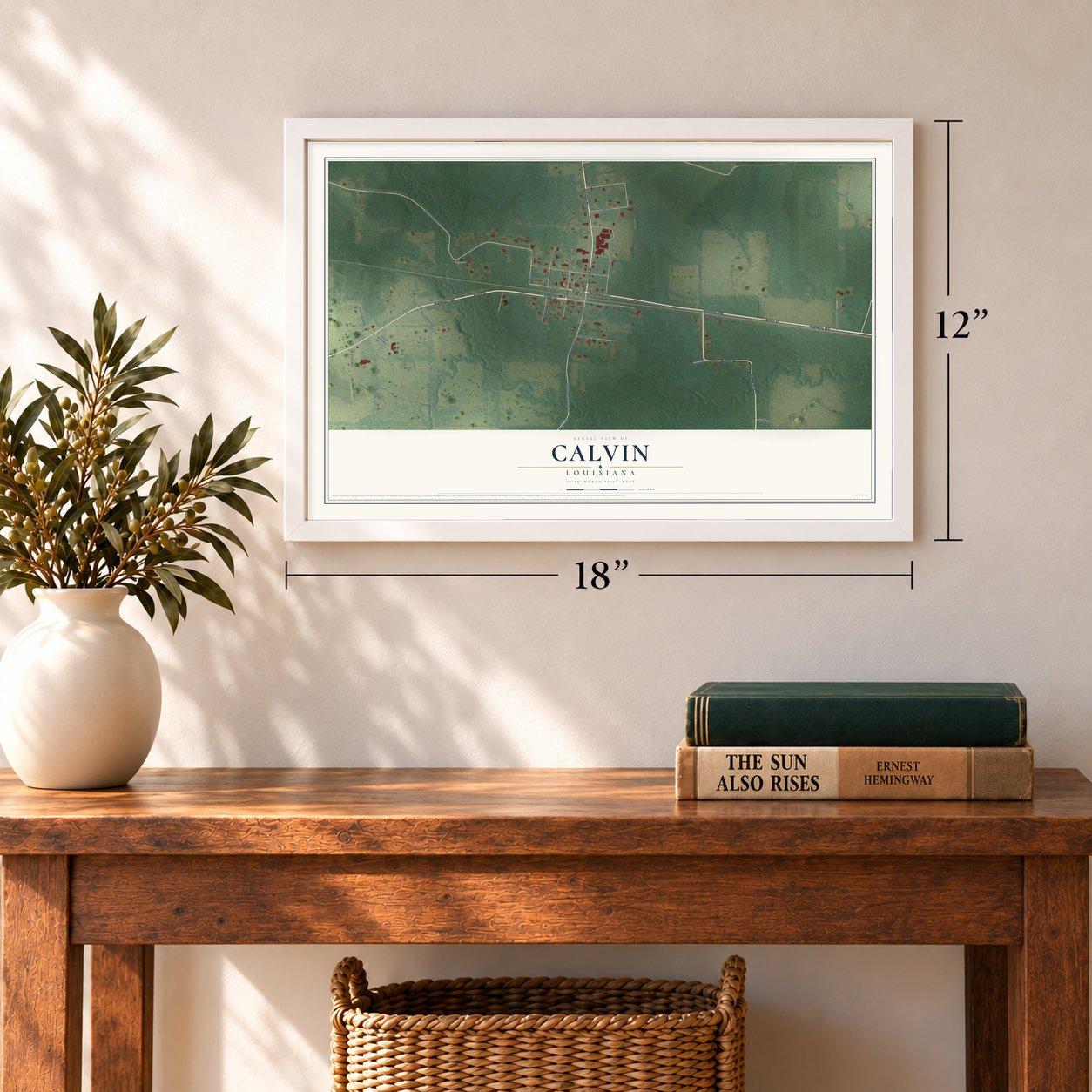 Calvin, Louisiana map, 12 x 18 inch print in a white frame in an entryway