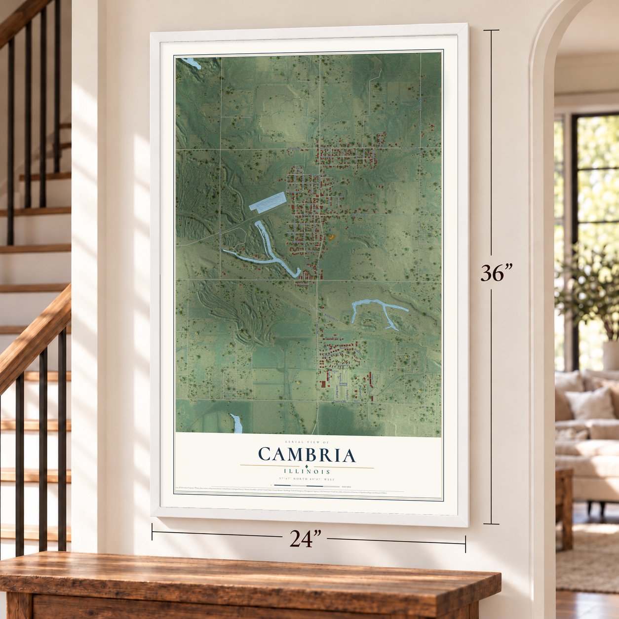 Cambria, Illinois map, 24 x 36 inch print in a white frame by a staircase