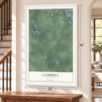 Cambria, Michigan map, 24 x 36 inch print in a white frame by a staircase