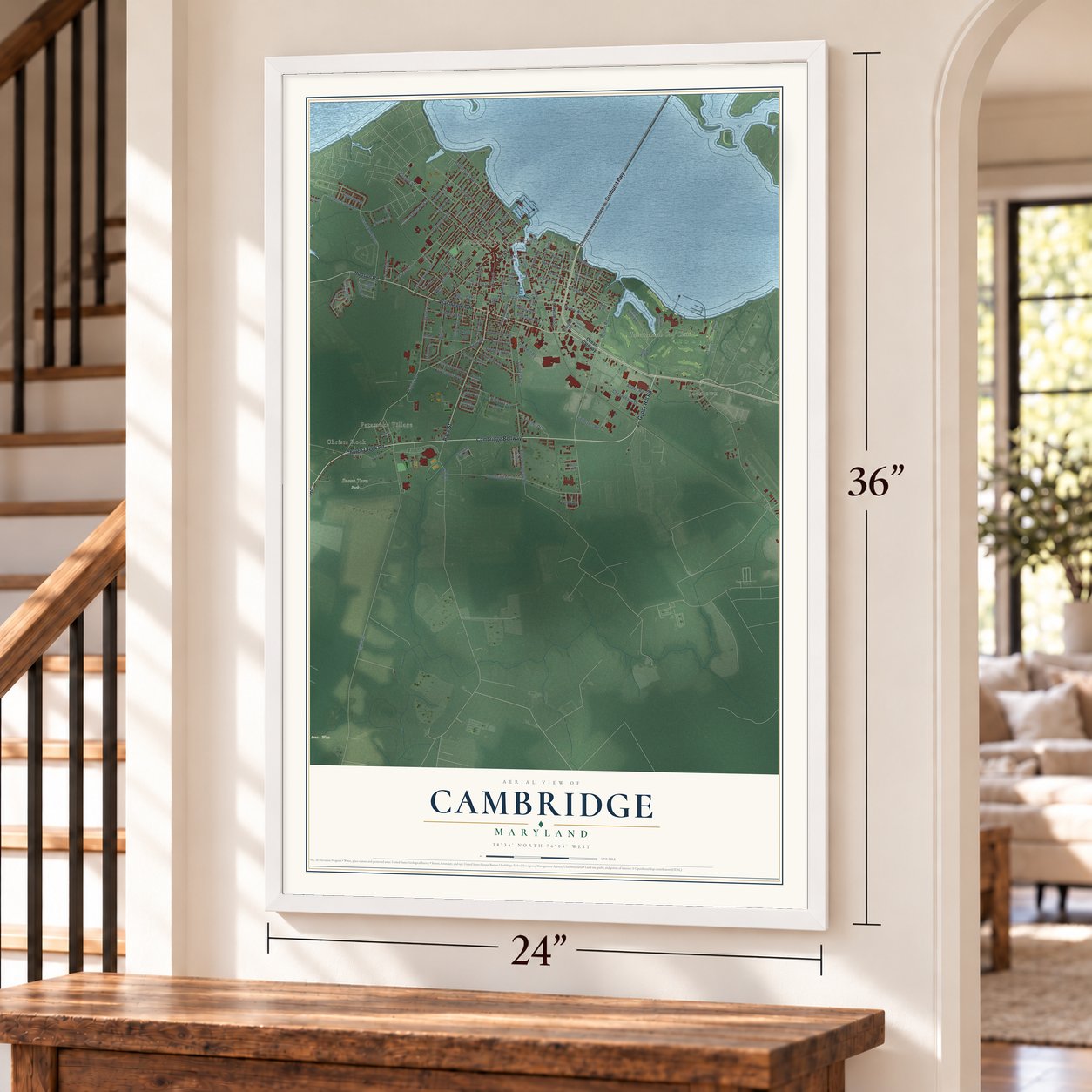 Cambridge, Maryland map, 24 x 36 inch print in a white frame by a staircase