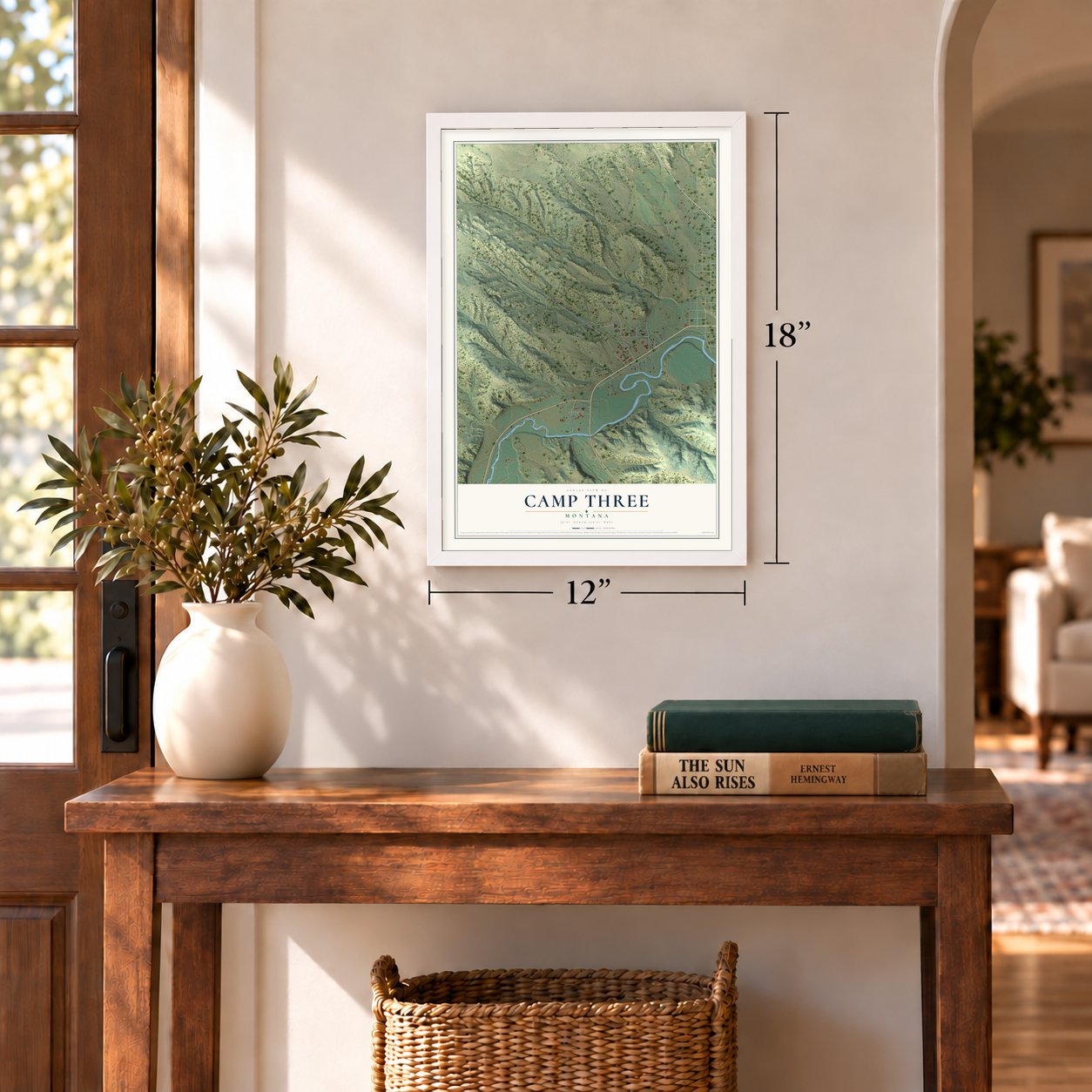 Camp Three, Montana map, 12 x 18 inch print in a white frame in an entryway