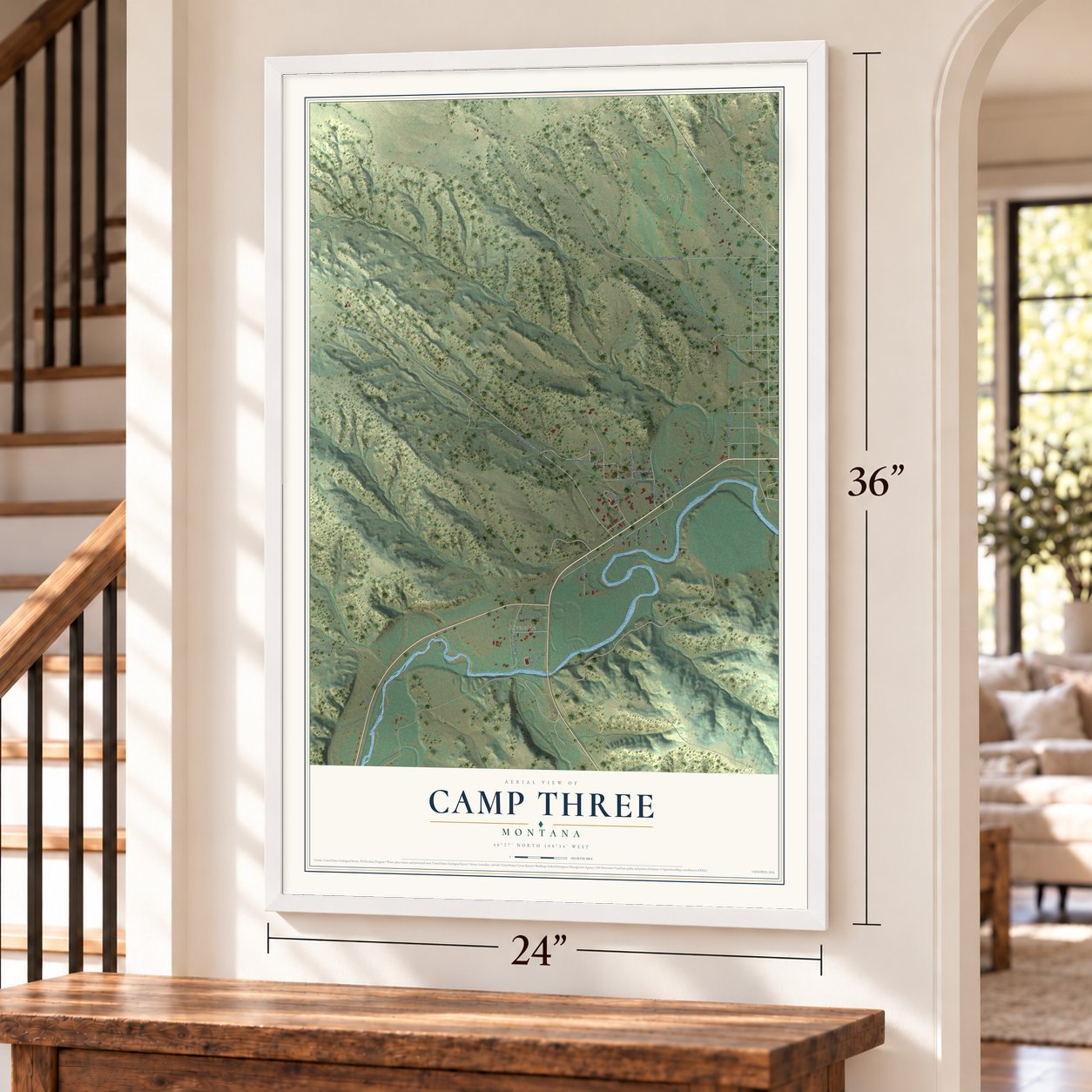 Camp Three, Montana map, 24 x 36 inch print in a white frame by a staircase