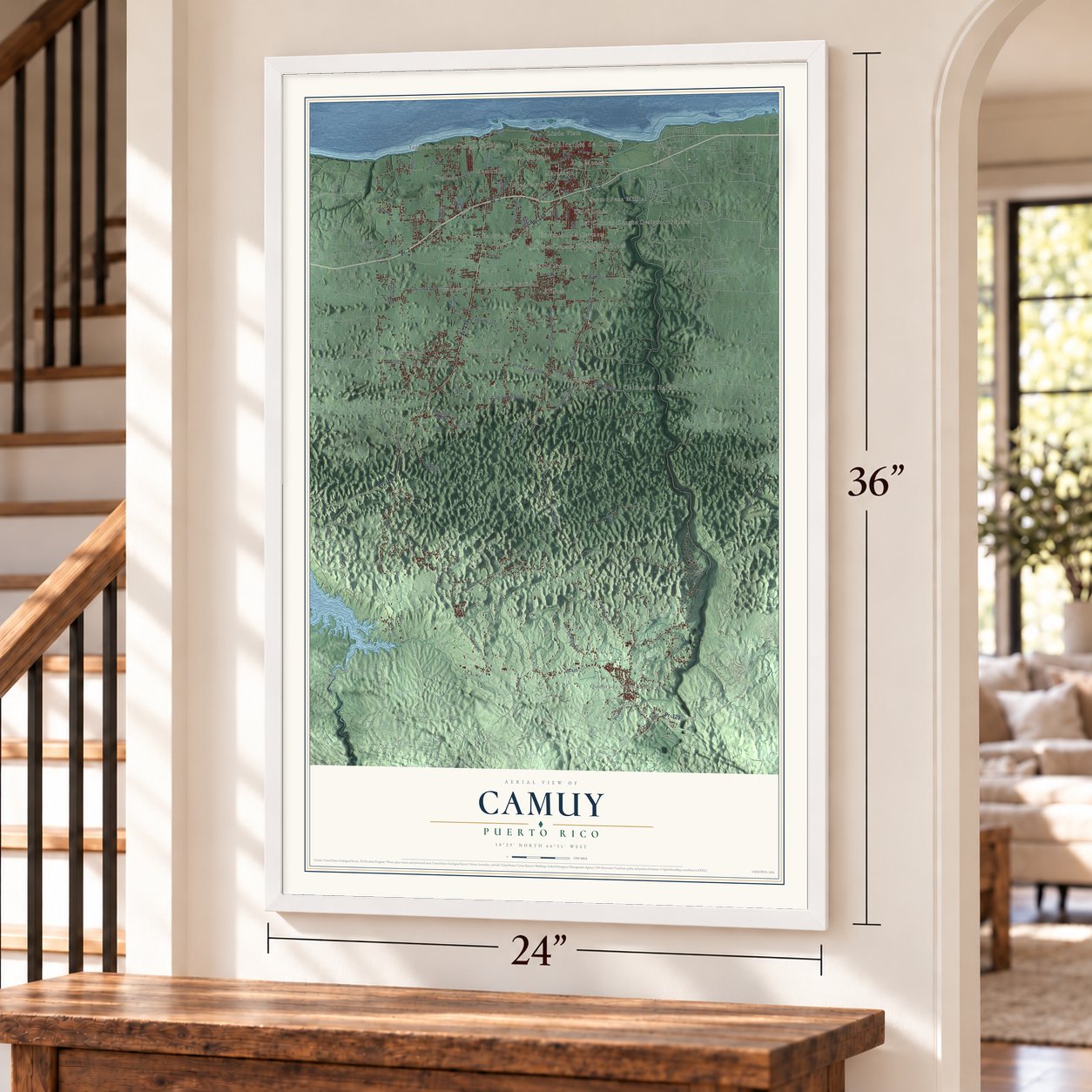 Camuy, Puerto Rico map, 24 x 36 inch print in a white frame by a staircase