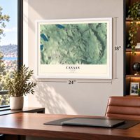 Canaan, Vermont map, 18 x 24 inch print in a white frame in a home office
