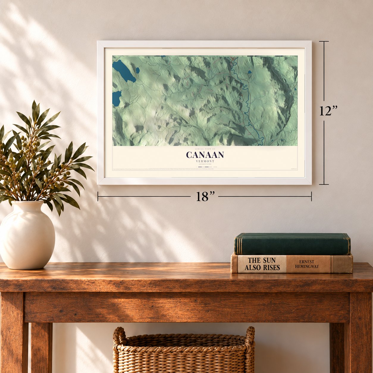 Canaan, Vermont map, 12 x 18 inch print in a white frame in an entryway