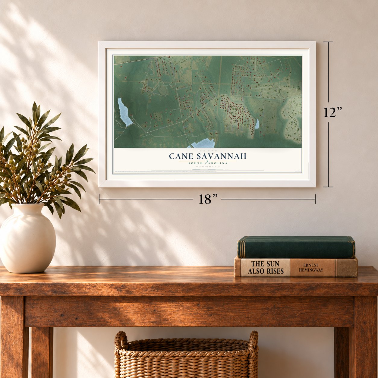 Cane Savannah, South Carolina map, 12 x 18 inch print in a white frame in an entryway