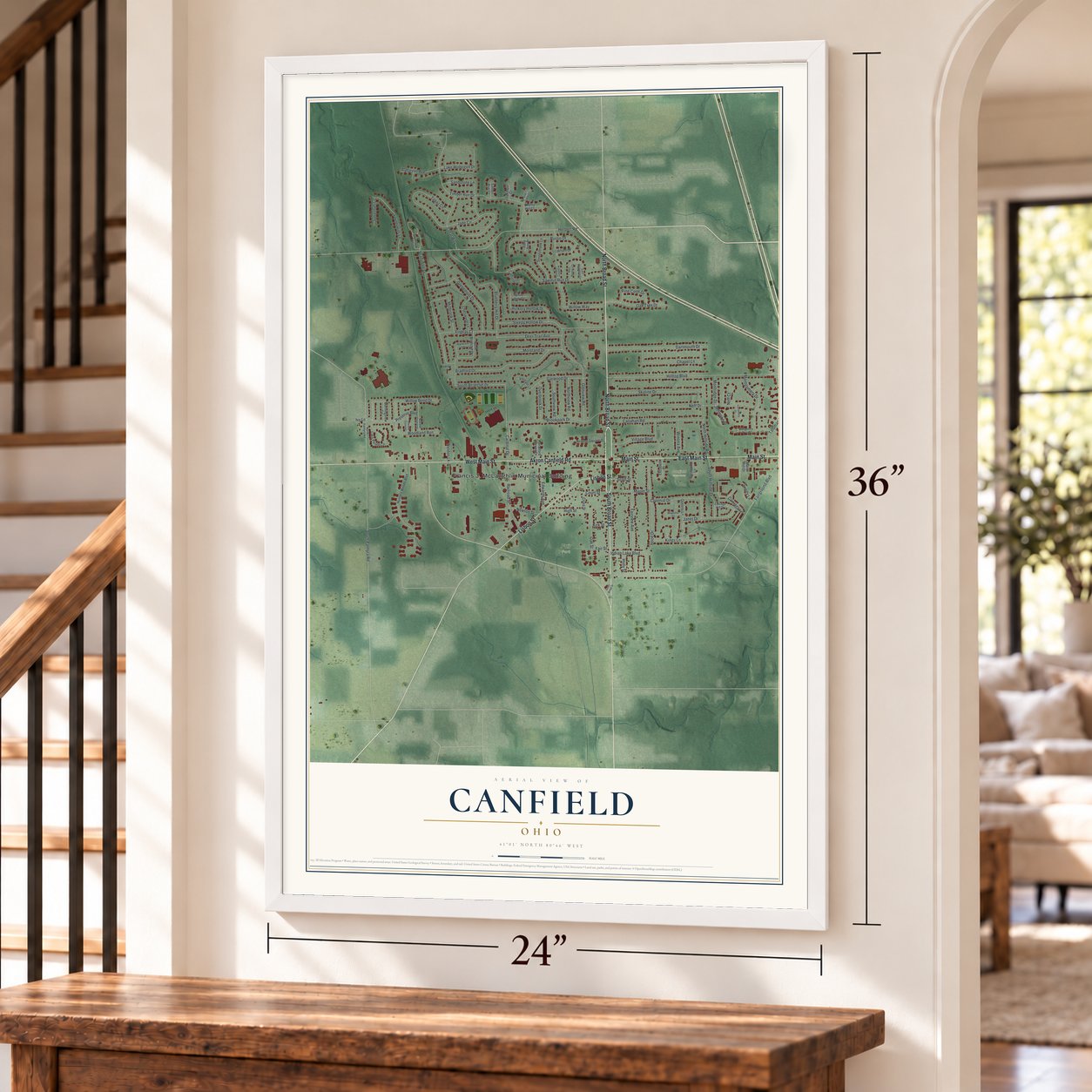 Canfield, Ohio map, 24 x 36 inch print in a white frame by a staircase