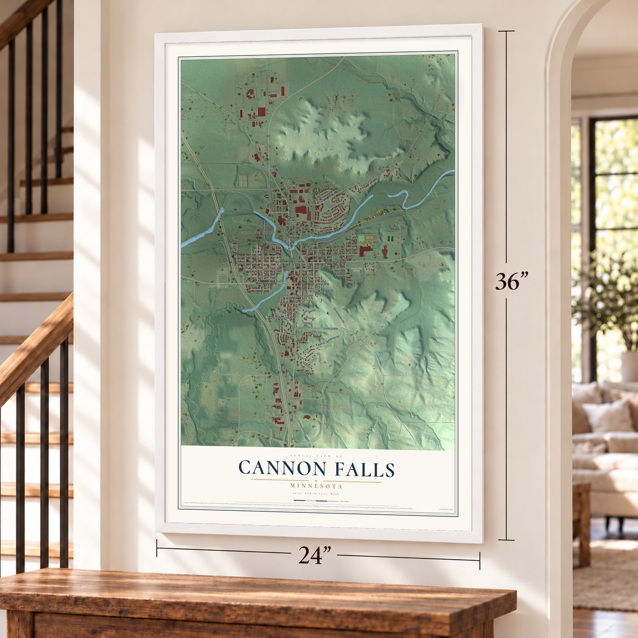 Cannon Falls, Minnesota map, 24 x 36 inch print in a white frame by a staircase