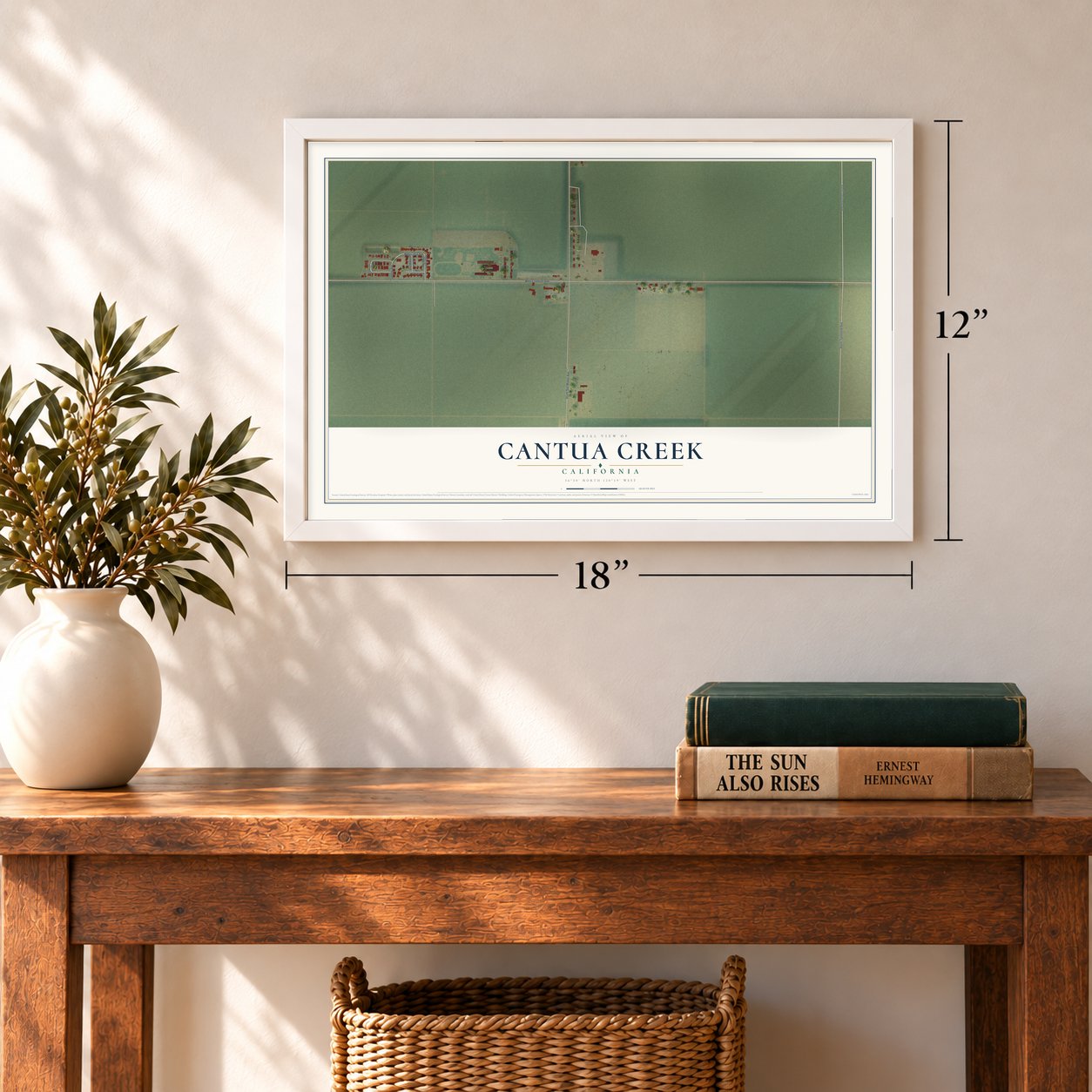 Cantua Creek, California map, 12 x 18 inch print in a white frame in an entryway