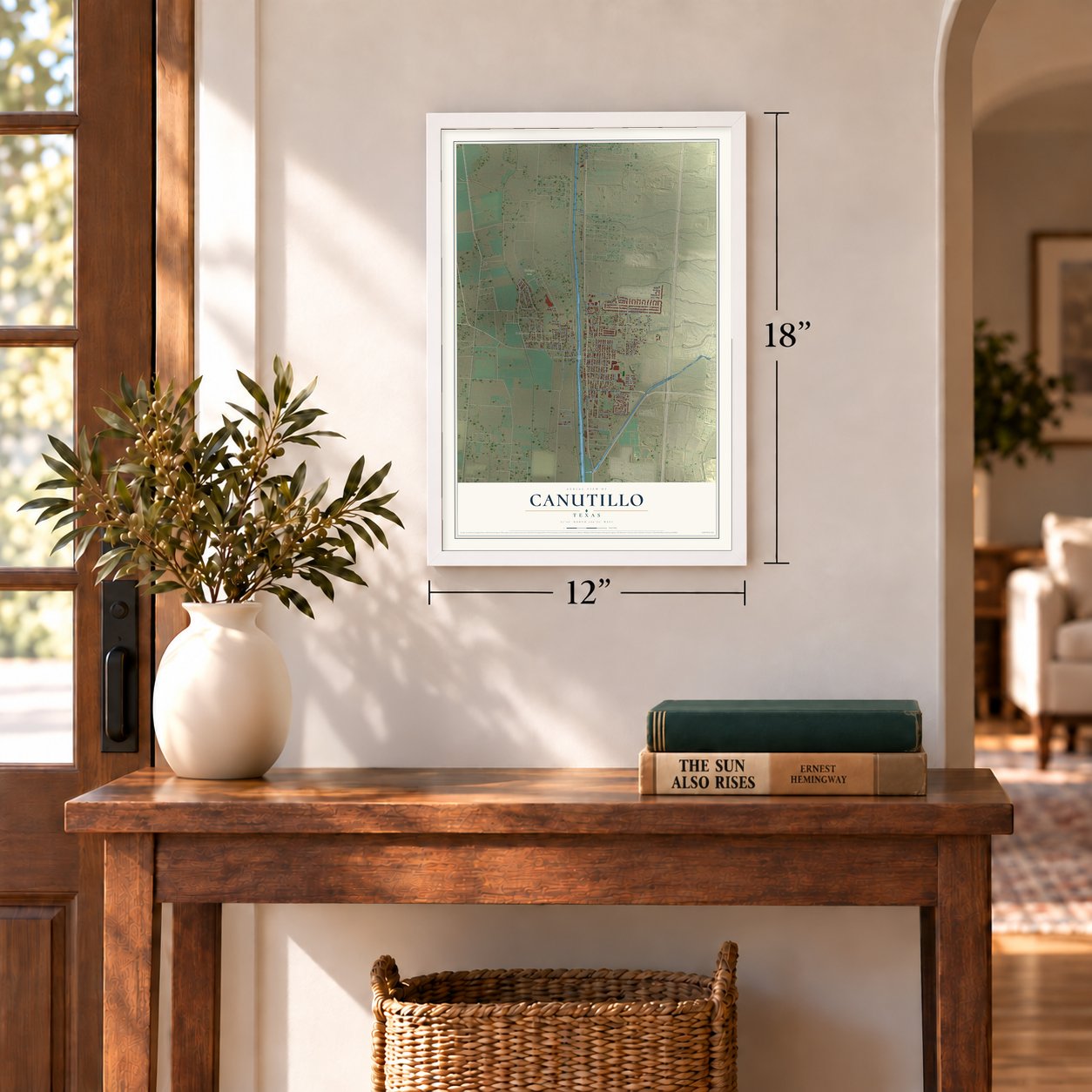 Canutillo, Texas map, 12 x 18 inch print in a white frame in an entryway