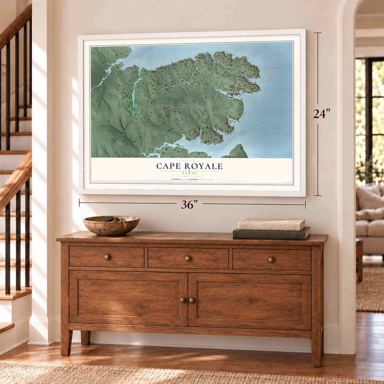 Cape Royale, Texas map, 24 x 36 inch print in a white frame above a dresser by a staircase