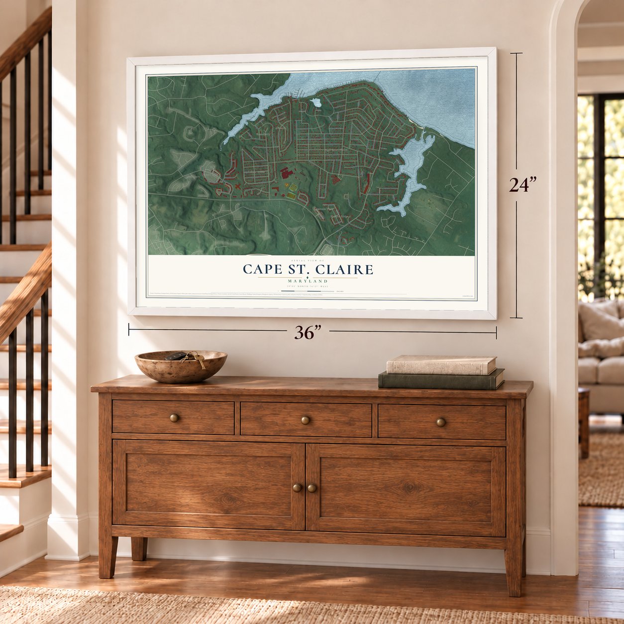 Cape St. Claire, Maryland map, 24 x 36 inch print in a white frame above a dresser by a staircase