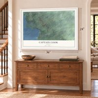 Captain Cook, Hawaii map, 24 x 36 inch print in a white frame above a dresser by a staircase