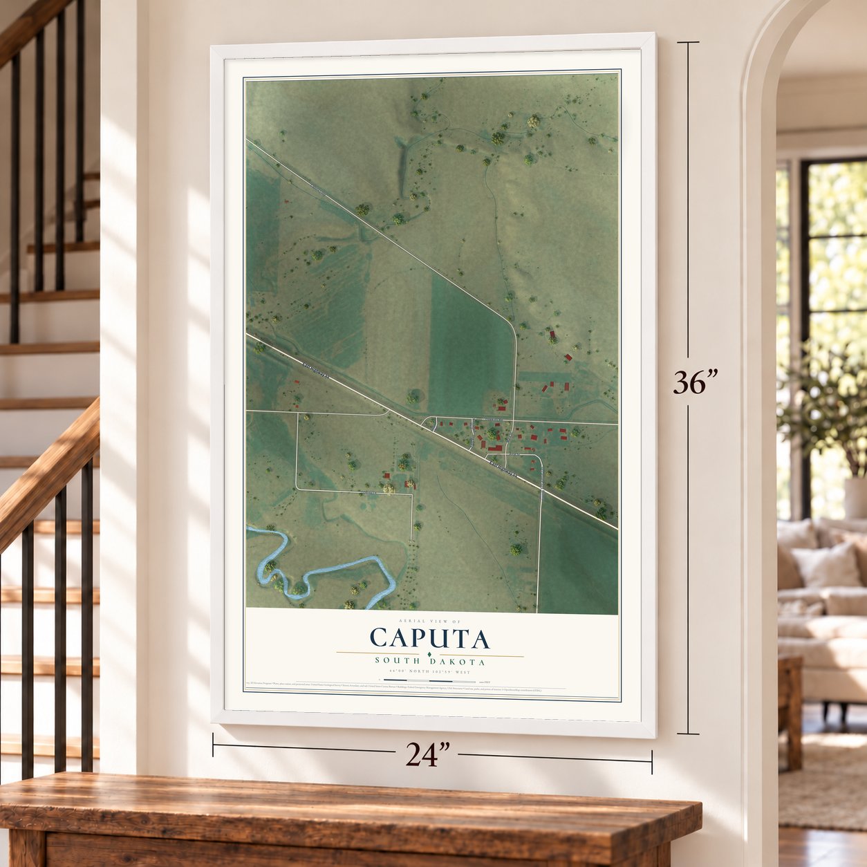 Caputa, South Dakota map, 24 x 36 inch print in a white frame by a staircase