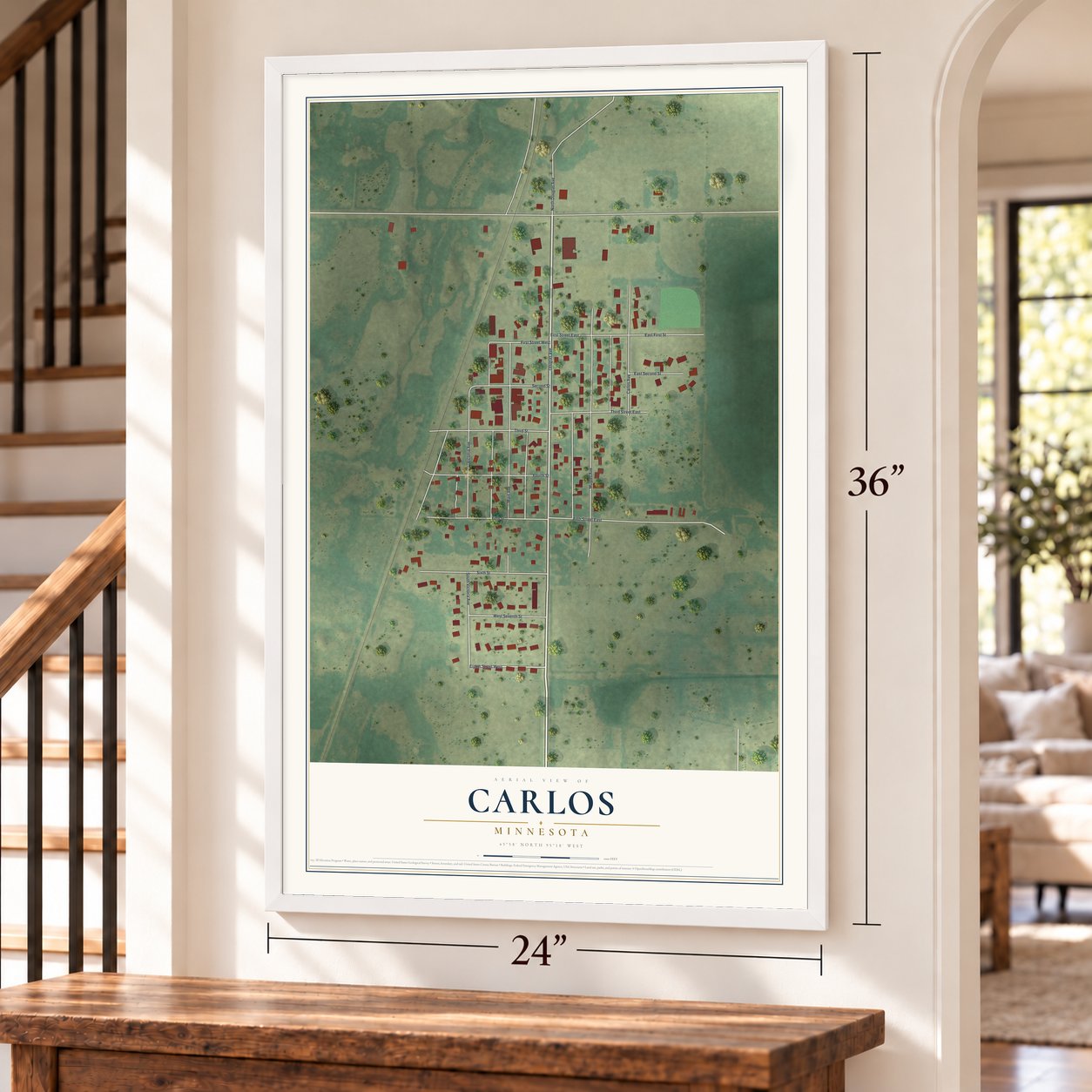 Carlos, Minnesota map, 24 x 36 inch print in a white frame by a staircase