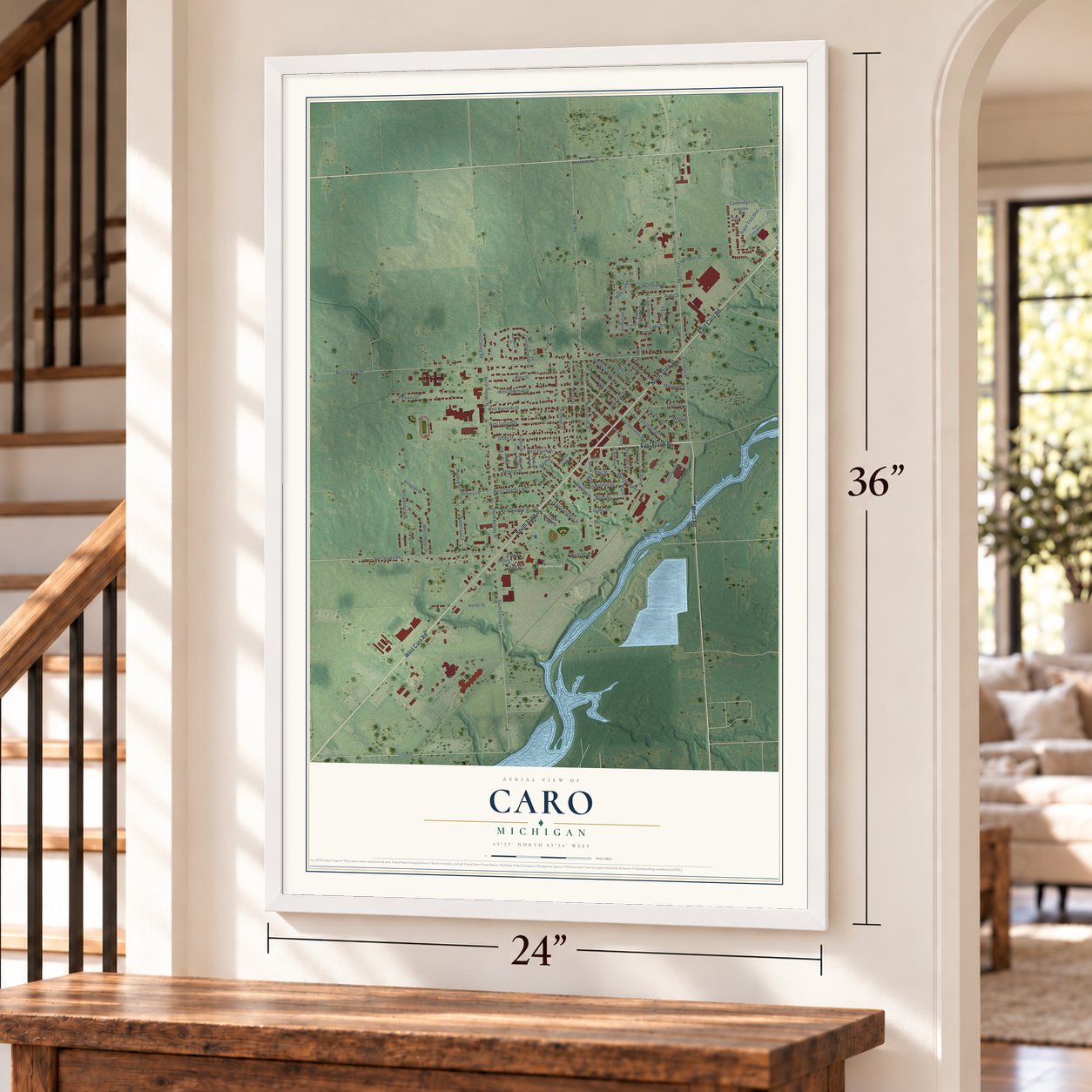 Caro, Michigan map, 24 x 36 inch print in a white frame by a staircase