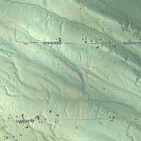 Second close-up of the map of Carp Lake, Emmet County, Michigan print showing more streets and buildings