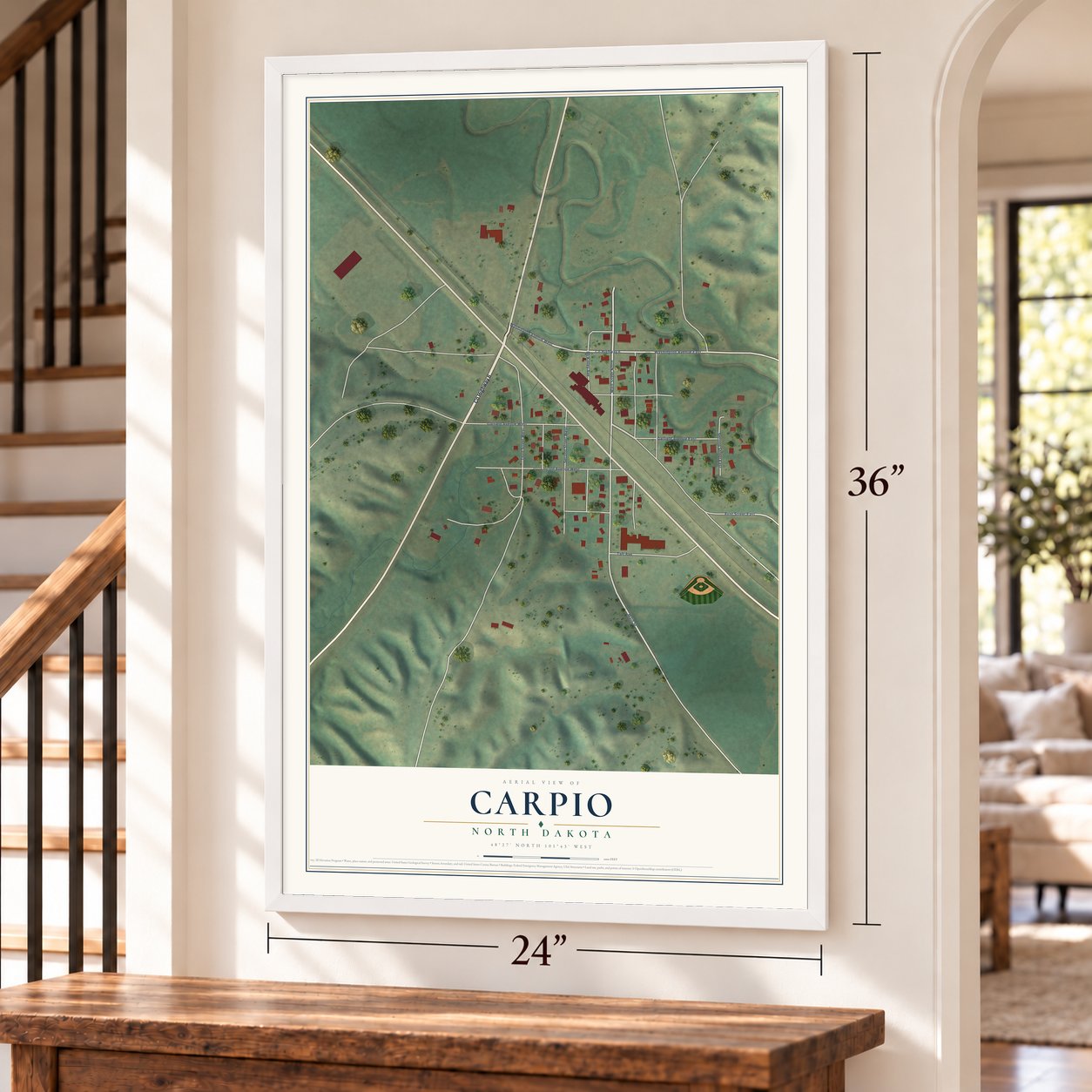 Carpio, North Dakota map, 24 x 36 inch print in a white frame by a staircase