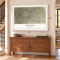 Carrizozo, New Mexico map, 24 x 36 inch print in a white frame above a dresser by a staircase