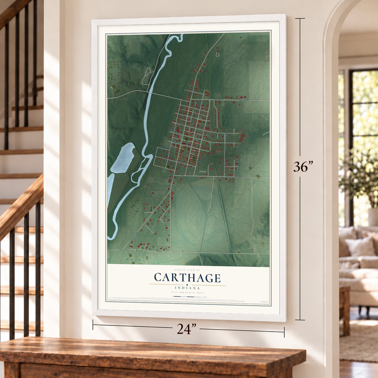 Carthage, Indiana map, 24 x 36 inch print in a white frame by a staircase