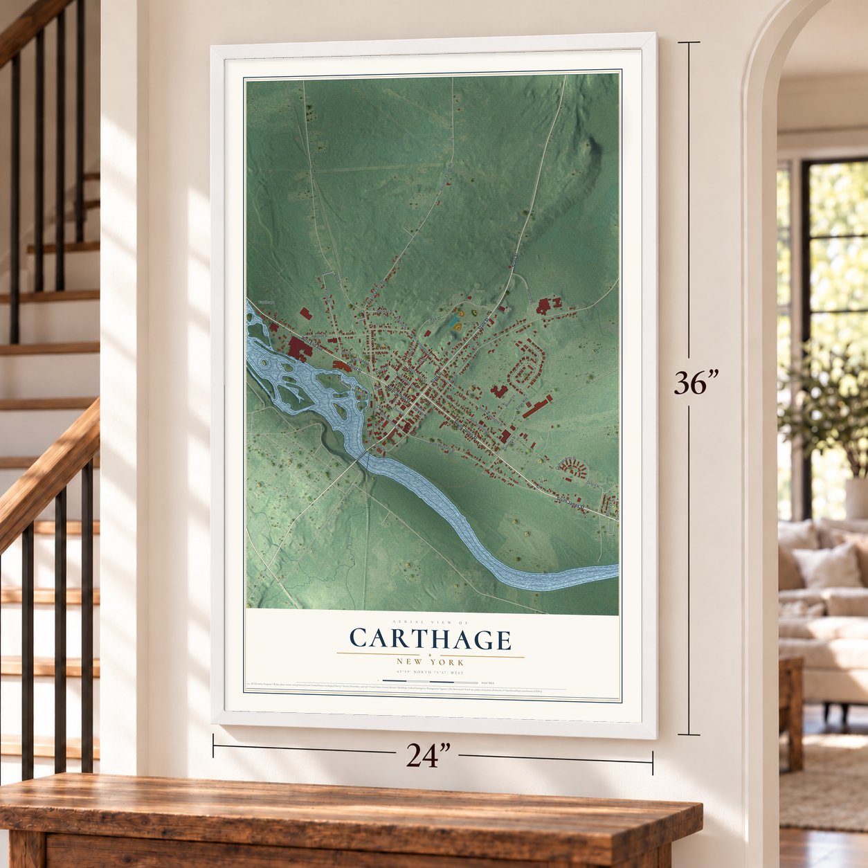 Carthage, New York map, 24 x 36 inch print in a white frame by a staircase