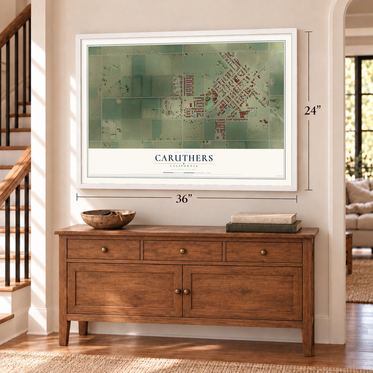 Caruthers, California map, 24 x 36 inch print in a white frame above a dresser by a staircase
