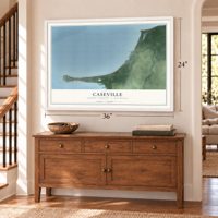 Caseville, Huron County, Michigan map, 24 x 36 inch print in a white frame above a dresser by a staircase