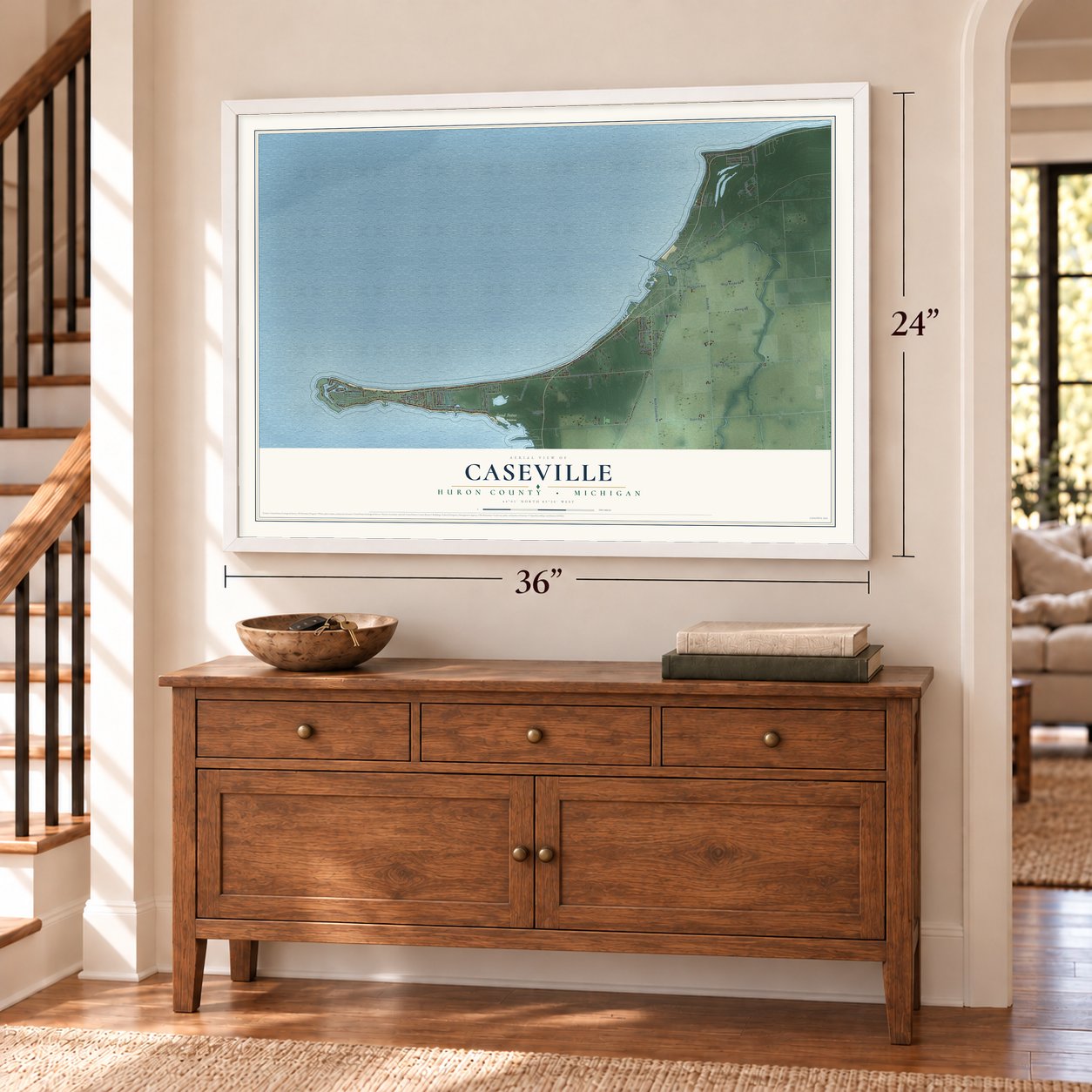 Caseville, Huron County, Michigan map, 24 x 36 inch print in a white frame above a dresser by a staircase