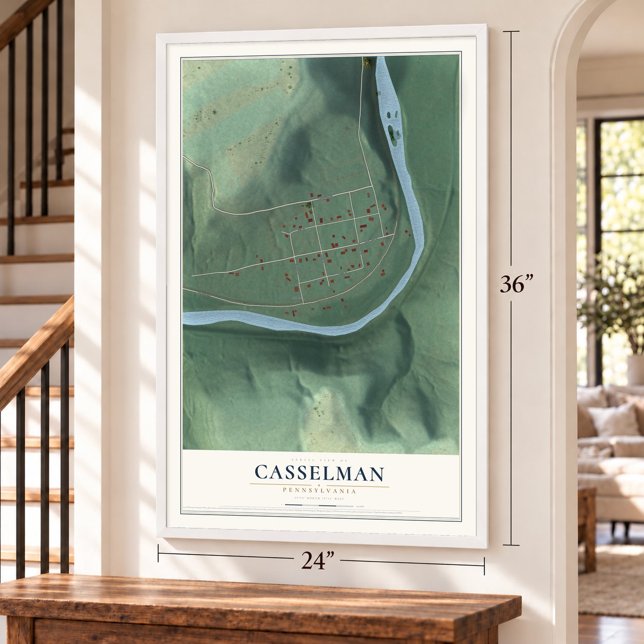 Casselman, Pennsylvania map, 24 x 36 inch print in a white frame by a staircase