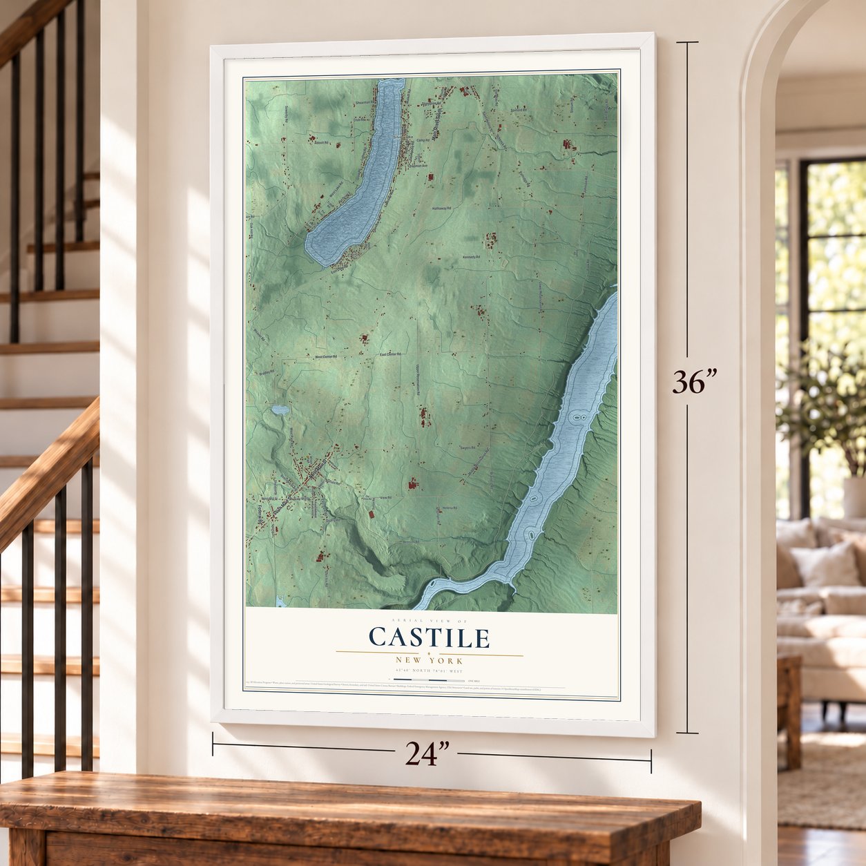 Castile, New York map, 24 x 36 inch print in a white frame by a staircase