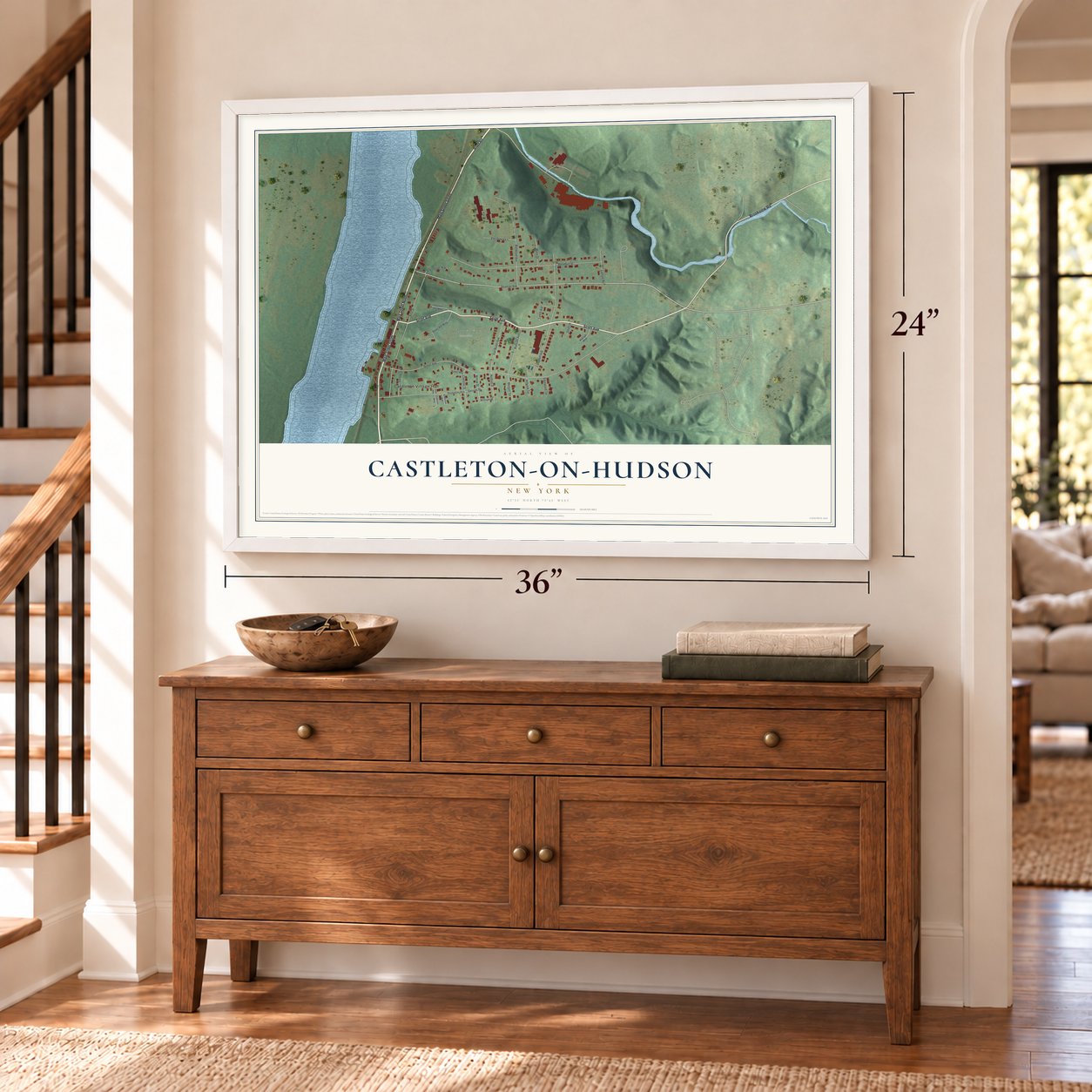 Castleton-on-Hudson, New York map, 24 x 36 inch print in a white frame above a dresser by a staircase