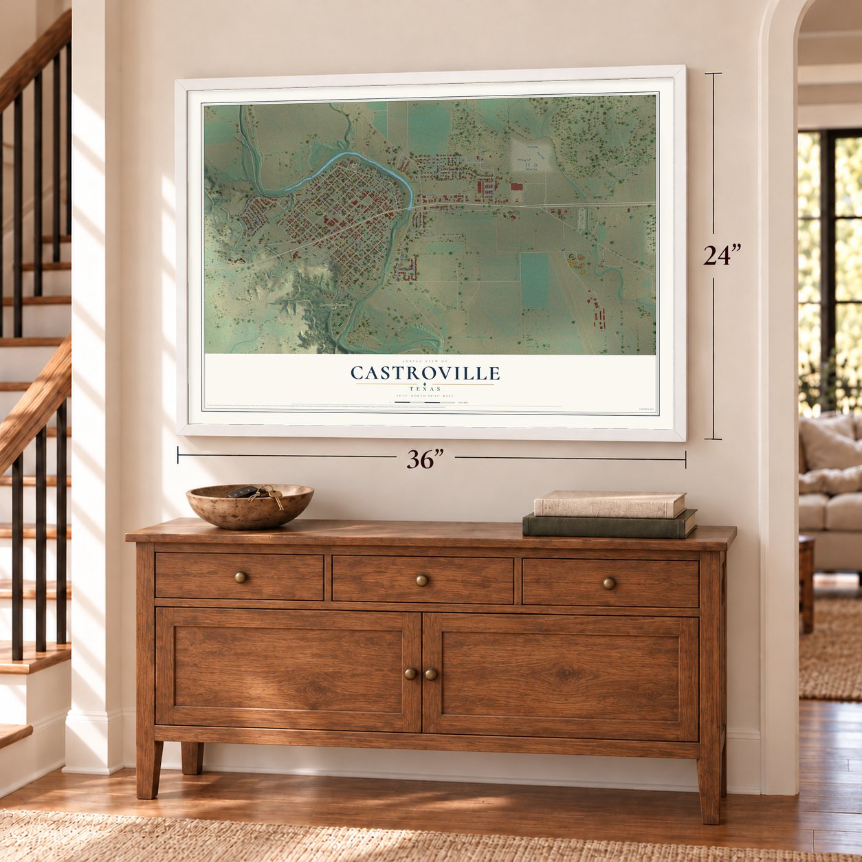 Castroville, Texas map, 24 x 36 inch print in a white frame above a dresser by a staircase