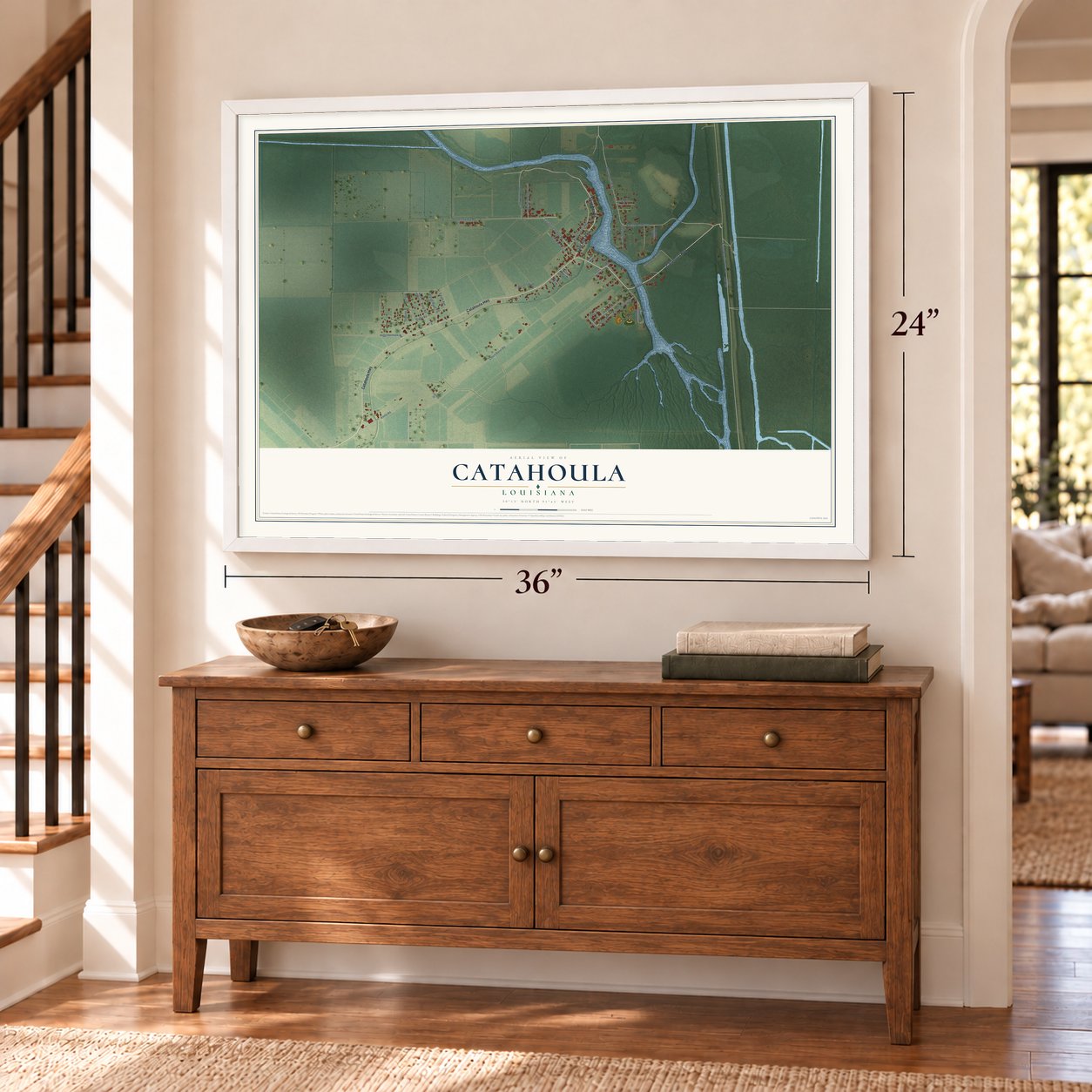 Catahoula, Louisiana map, 24 x 36 inch print in a white frame above a dresser by a staircase