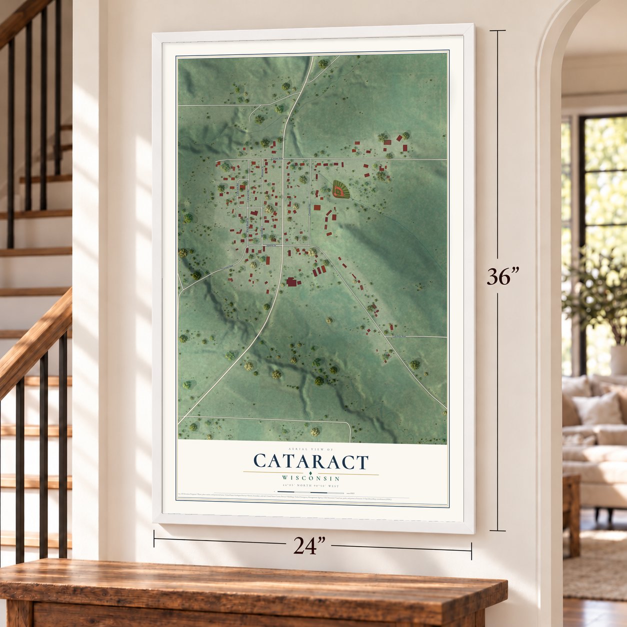 Cataract, Wisconsin map, 24 x 36 inch print in a white frame by a staircase