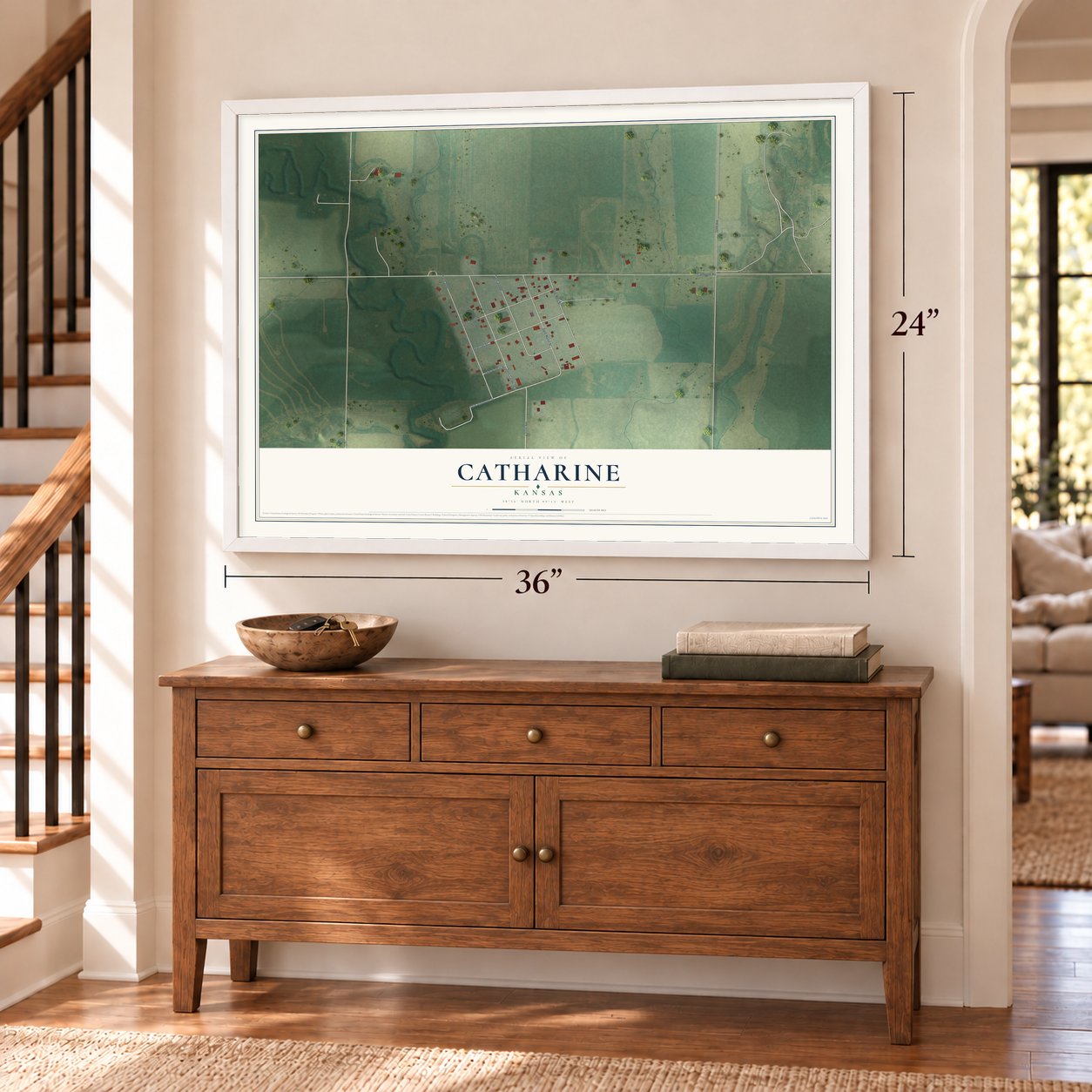 Catharine, Kansas map, 24 x 36 inch print in a white frame above a dresser by a staircase