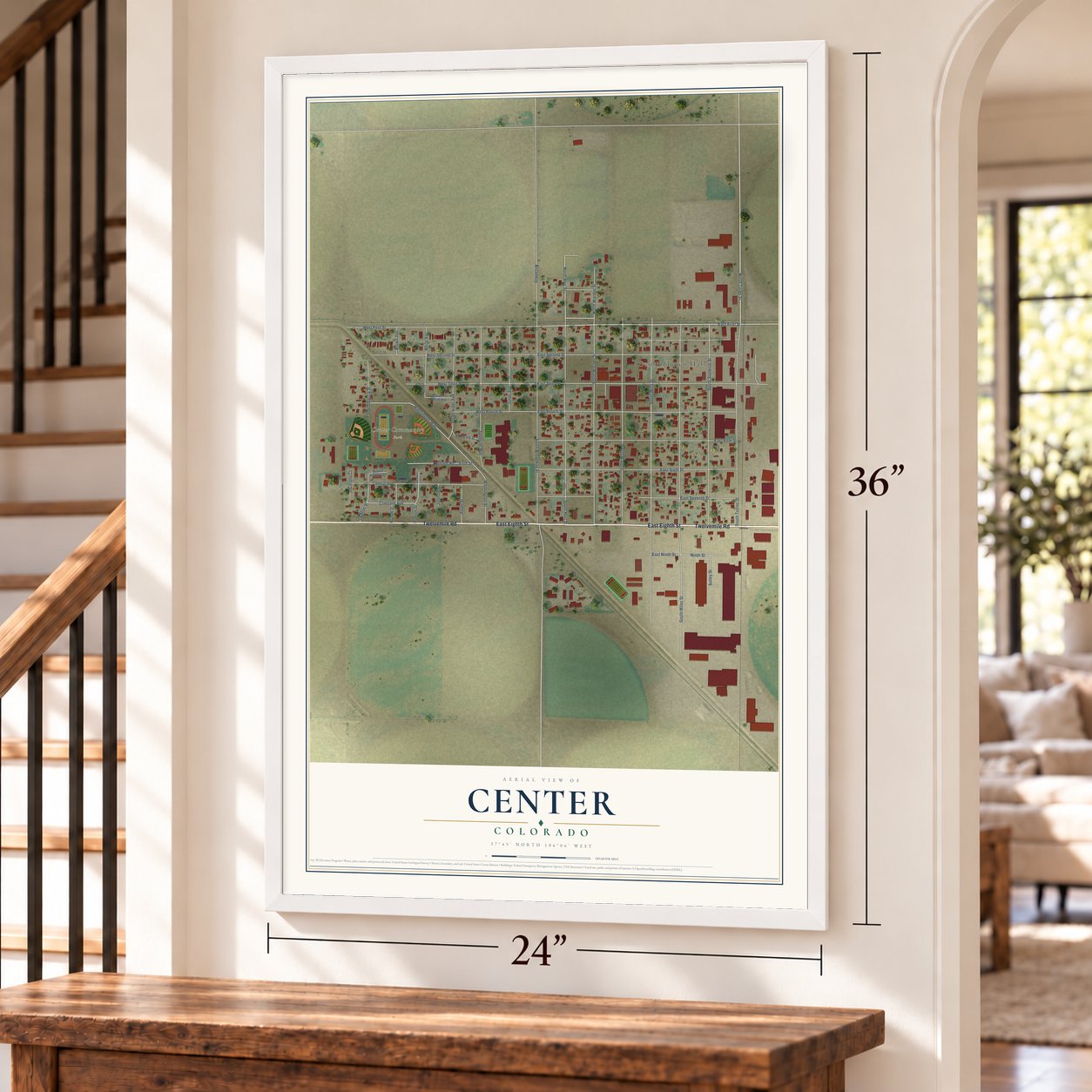 Center, Colorado map, 24 x 36 inch print in a white frame by a staircase