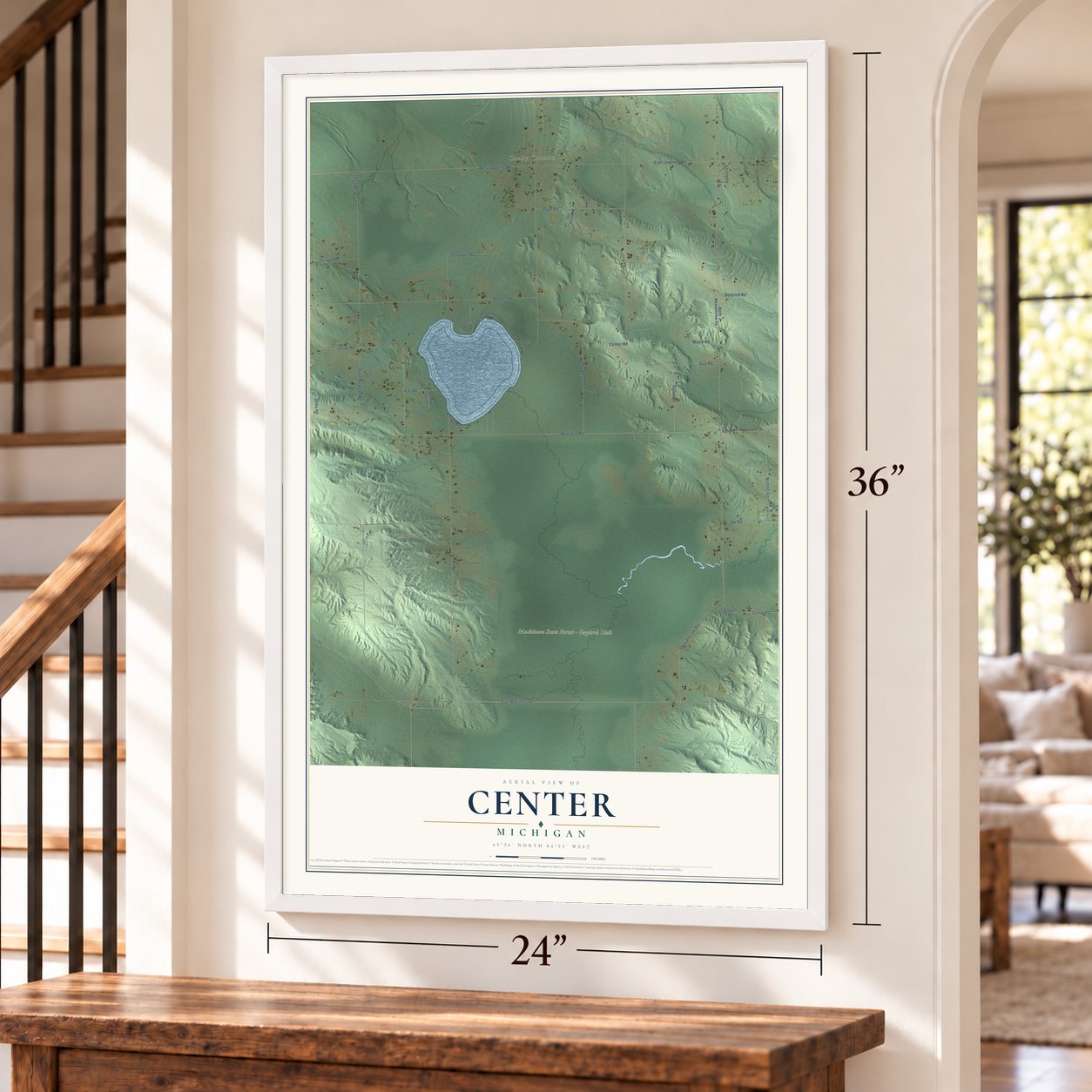 Center, Michigan map, 24 x 36 inch print in a white frame by a staircase
