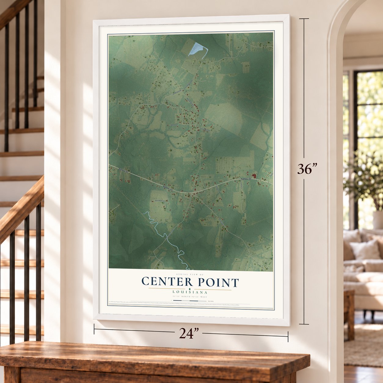 Center Point, Louisiana map, 24 x 36 inch print in a white frame by a staircase