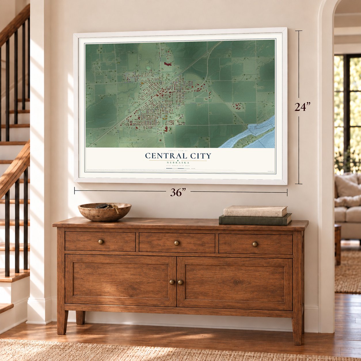 Central City, Nebraska map, 24 x 36 inch print in a white frame above a dresser by a staircase