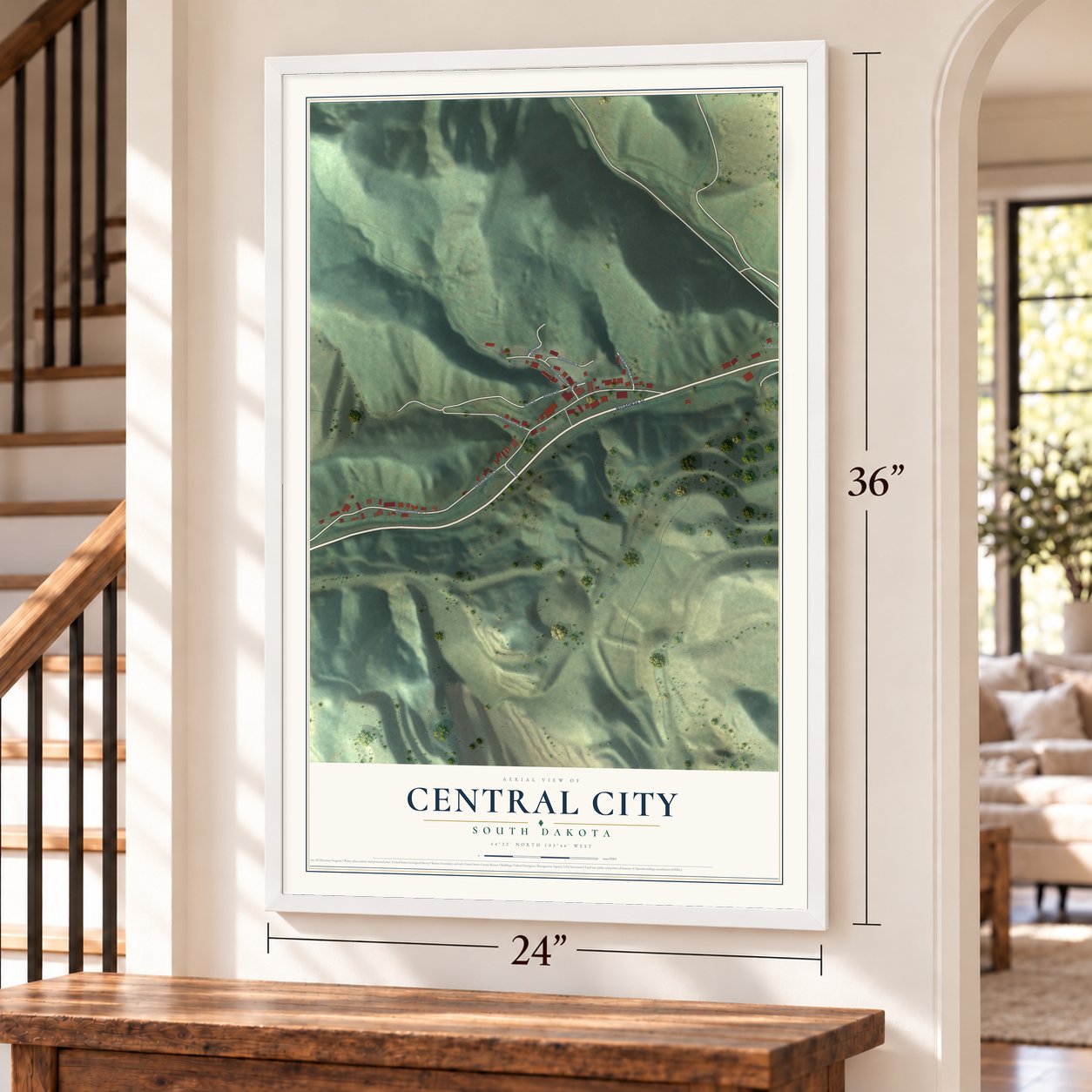 Central City, South Dakota map, 24 x 36 inch print in a white frame by a staircase