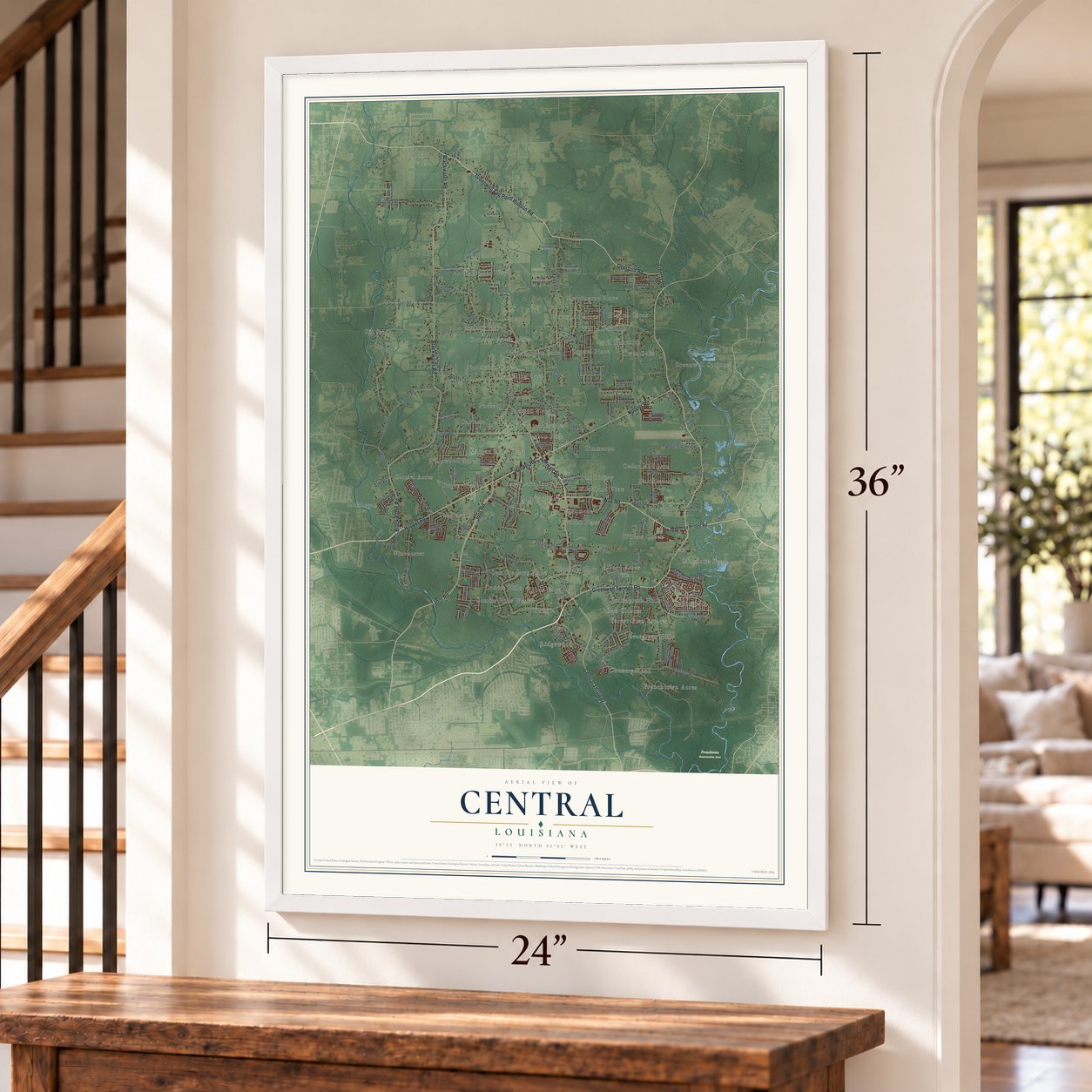 Central, Louisiana map, 24 x 36 inch print in a white frame by a staircase