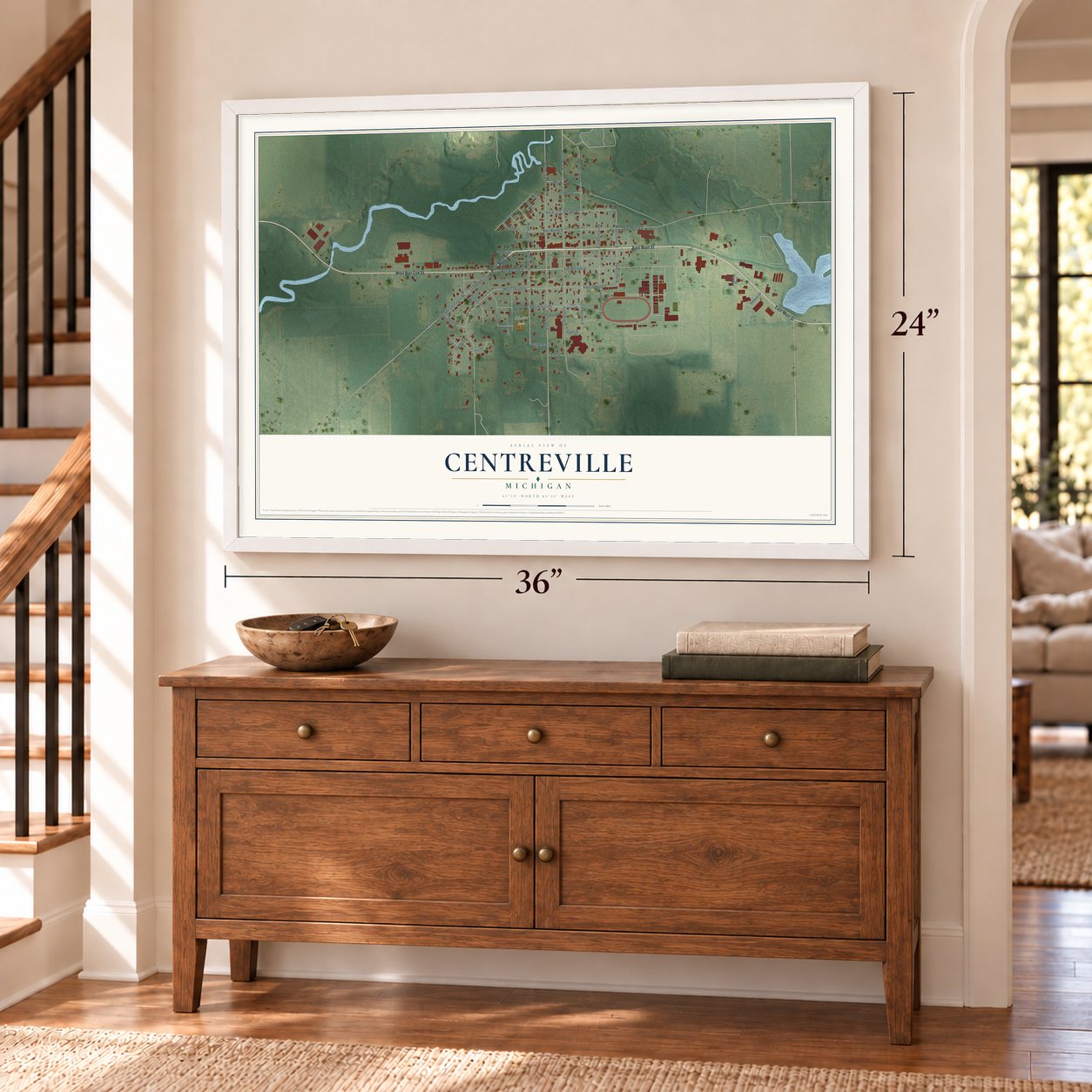 Centreville, Michigan map, 24 x 36 inch print in a white frame above a dresser by a staircase