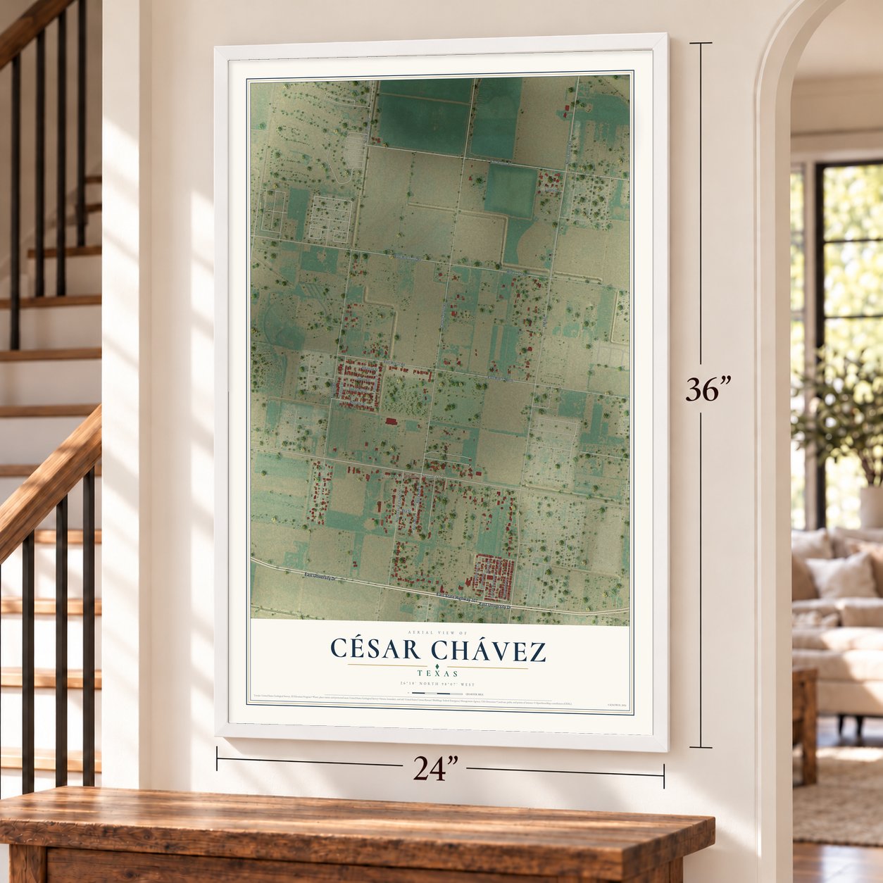 César Chávez, Texas map, 24 x 36 inch print in a white frame by a staircase