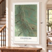 Chadwicks, New York map, 24 x 36 inch print in a white frame by a staircase