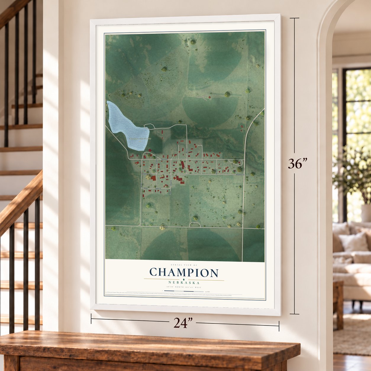Champion, Nebraska map, 24 x 36 inch print in a white frame by a staircase