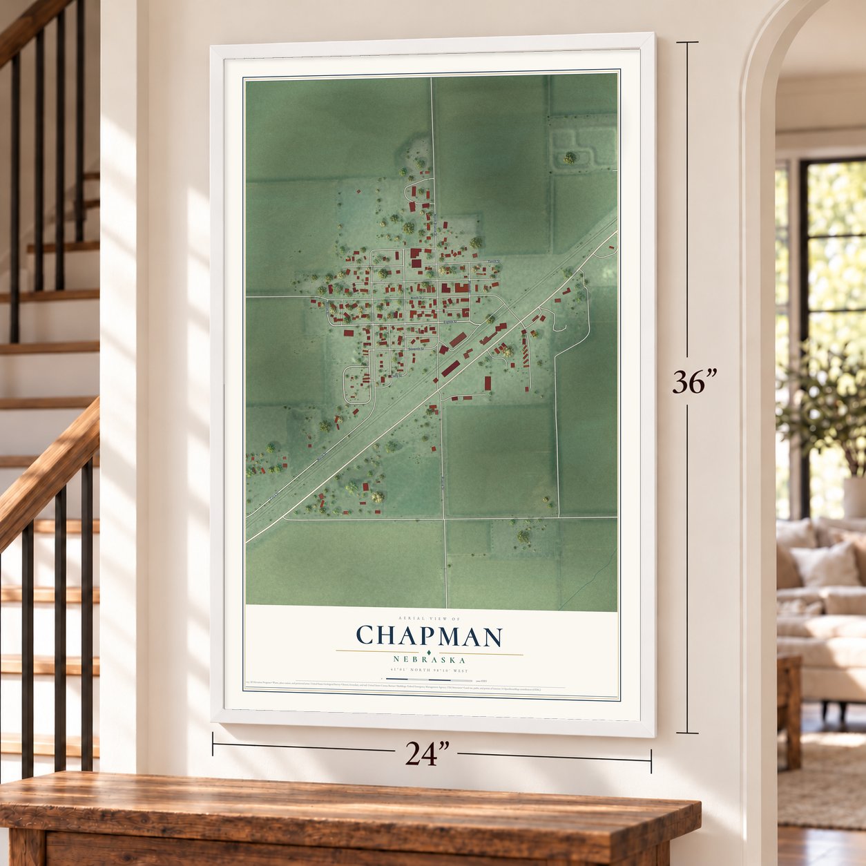 Chapman, Nebraska map, 24 x 36 inch print in a white frame by a staircase