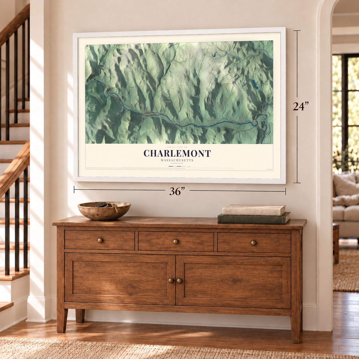 Charlemont, Massachusetts map, 24 x 36 inch print in a white frame above a dresser by a staircase