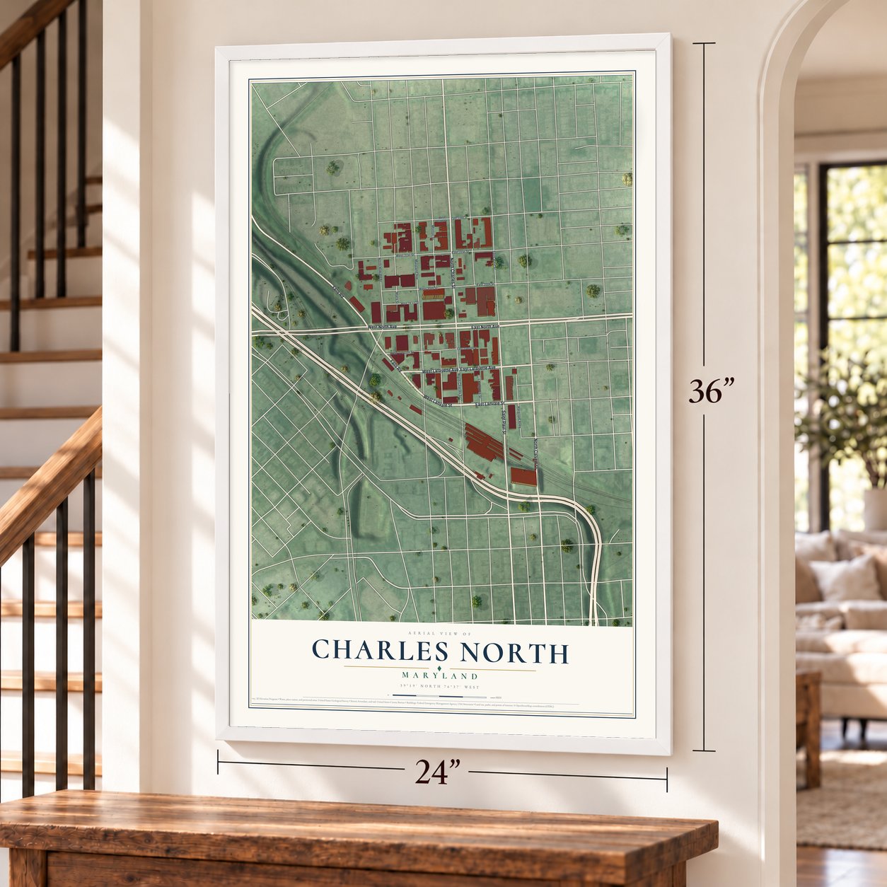 Charles North, Maryland map, 24 x 36 inch print in a white frame by a staircase