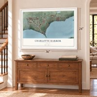 Charlotte Harbor, Florida map, 24 x 36 inch print in a white frame above a dresser by a staircase